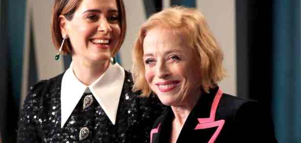 Sarah Paulson and Holland Taylor are seen smiling at the camera while attending the 2020 Vanity Fair Oscar party