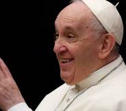 Pope Francis gestures as he meets with attendees during the weekly general audience