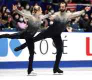 Figure skaters Ashley Cain-Gribble and Timothy LeDuc wear monochromatic ombre skating outfits while competing at the ISU Grand Prix of Figure Skating