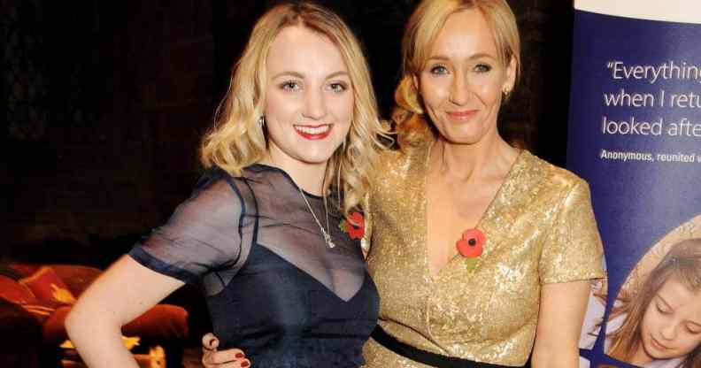 Evanna Lynch and J.K. Rowling smile at the camera while attending a fundraising event