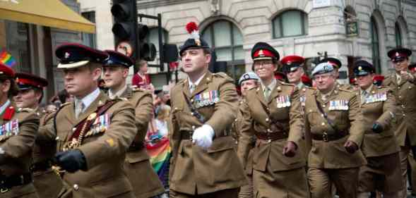 A group of UK army soldiers march in Pride in London parade