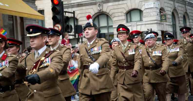 A group of UK army soldiers march in Pride in London parade