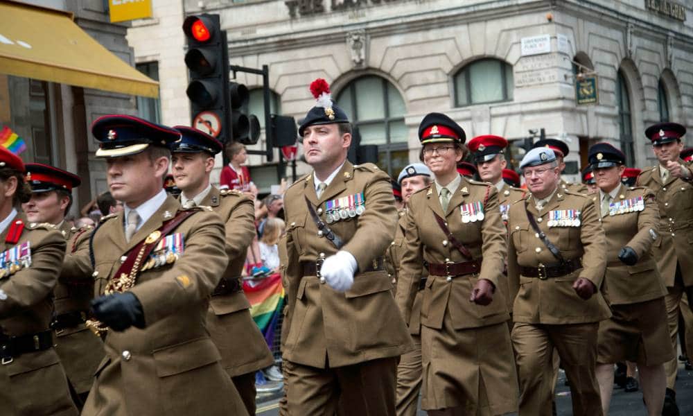 A group of UK army soldiers march in Pride in London parade