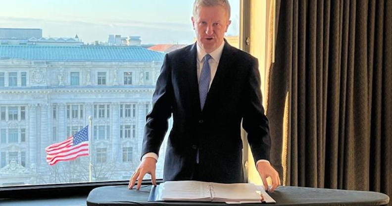 Oliver Dowden uses an ironing board to prepare for his speech to The Heritage Foundation