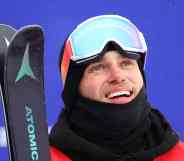 Gus Kenworthy of Team Great Britain reacts after their first run during the Men's Freestyle Skiing Freeski Halfpipe Qualification on Day 13 of the Beijing 2022 Winter Olympics