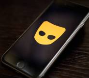 The Grindr app logo is seen on a mobile phone screen