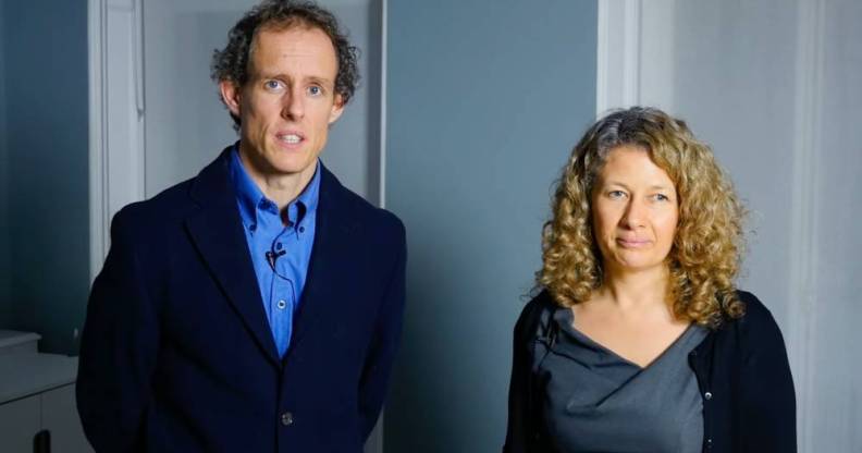 Nigel and Sally Rowe, parents from the Isle of Wight in England, stand in a room