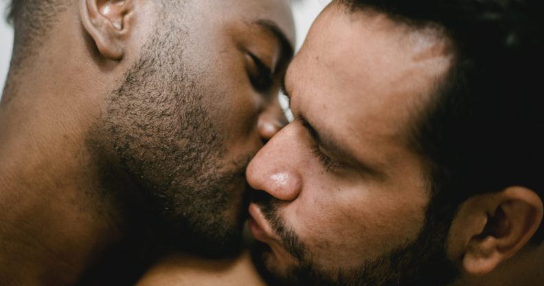 two men kissing