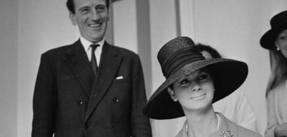 English fashion model and former Merchant Navy sailor April Ashley pictured signing the marriage register with her husband Arthur Corbett (1919-1993) on the day of their wedding in Gibraltar on 11th September 1963.