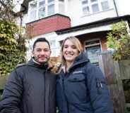 Hannah and Jake Graf pose outside their London home