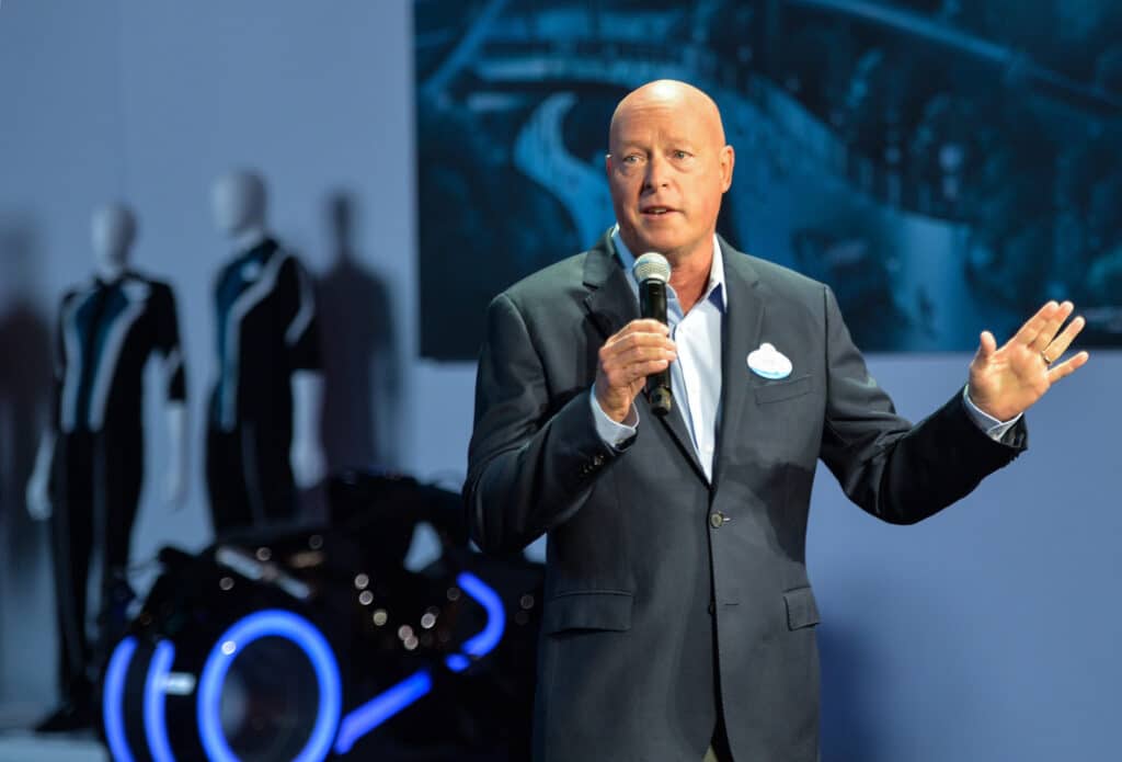 Bob Chapek speaks on stage in a suit