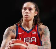 Brittney Griner, a basketball player, wears a red Team USA jersey to the 2020 Tokyo Olympics