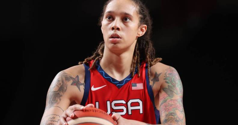 Brittney Griner, a basketball player, wears a red Team USA jersey to the 2020 Tokyo Olympics