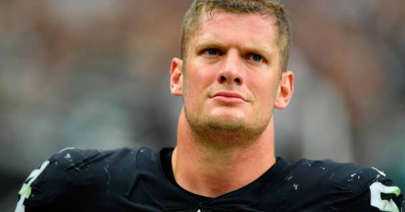 Las Vegas Raiders defensive end Carl Nassib looks on during a game against the Miami Dolphins at Allegiant Stadium