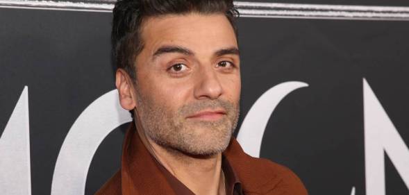 Actor Oscar Isaac attends Marvel's Moon Knight launch event wearing a rust brown jacket