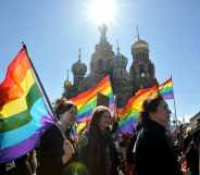 Gay rights activists march in Russia's second city of St. Petersburg May 1, 2013.