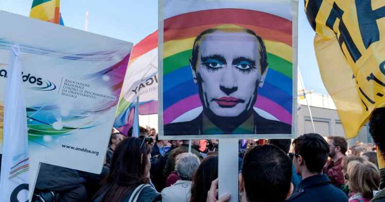 Protester hold a 'gay clown' poster of Russian President Vladimir Putin during the demonstration of LGBT Associations, in front of the Russian Embassy in Rome. The picture has been shared since the invasion of Ukraine