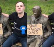 Alex Bramham posing with a statue