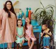 A photo of The McLeod Family consisting of mum Eeka McLeod and her three children Ella, Evan and Eli smiling at the camera or up at her