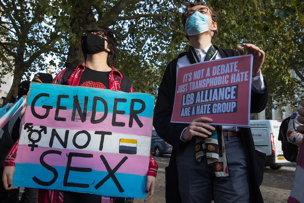 Activists protest outside the first annual LGB Alliance conference