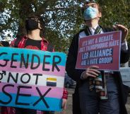 Activists protest outside the first annual LGB Alliance conference