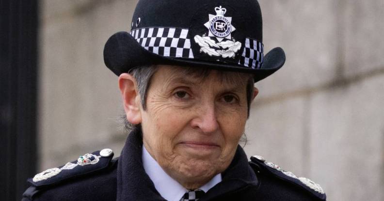 Outgoing Metropolitan Police commissioner Cressida Dick stares at the camera while wearing a black and white police uniform