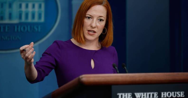 Jen Psaki, the White House press secretary, wears a purple outfit as she speaks to reporters at a briefing