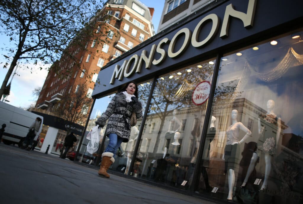  A shopper carries bags outside a Monsoon on King's Road in Chelsea 