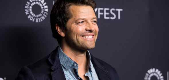 Misha Collins smiles on the red carpet