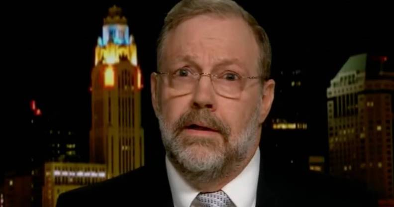 Nicholas Meriwether is pictured in a suit and tie during an interview with Fox News