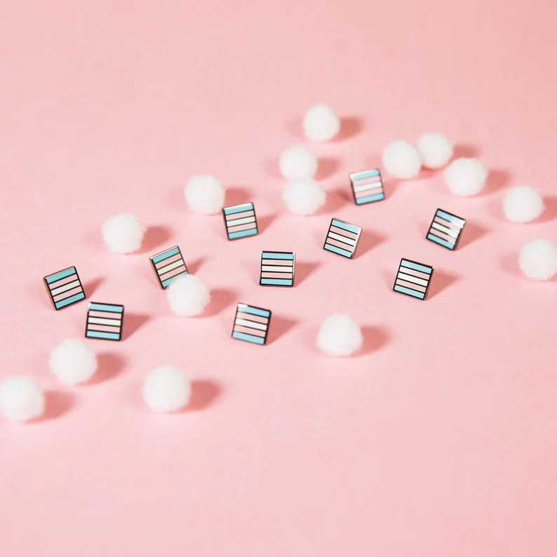 A mini trans flag pin