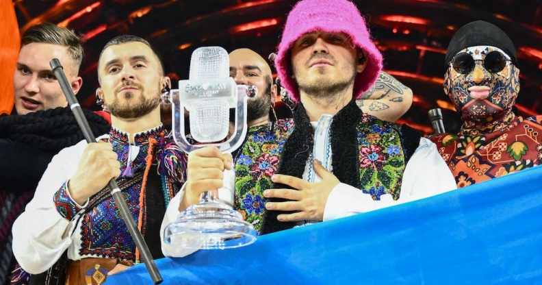 Ukraine's Kalush Orchestra pose with their Eurovision trophy