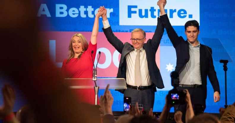 Anthony Albanese celebrates his election victory with his partner Jodie Haydon and son Nathan Albanese