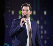 John Mulaney performs onstage