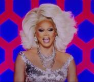 RuPaul laughs while hosting Drag Race season 14