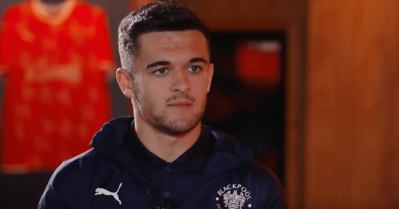 Blackpool footballer Jack Daniels sitting in a changing room