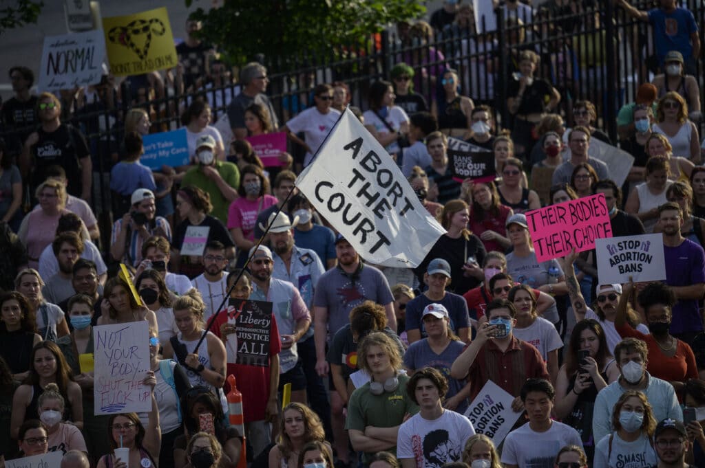 Abortion rights activists protest outside the Planned Parenthood Reproductive Health Services Center