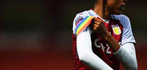 Elisha N'Dow of Aston Villa adjusts a rainbow armband