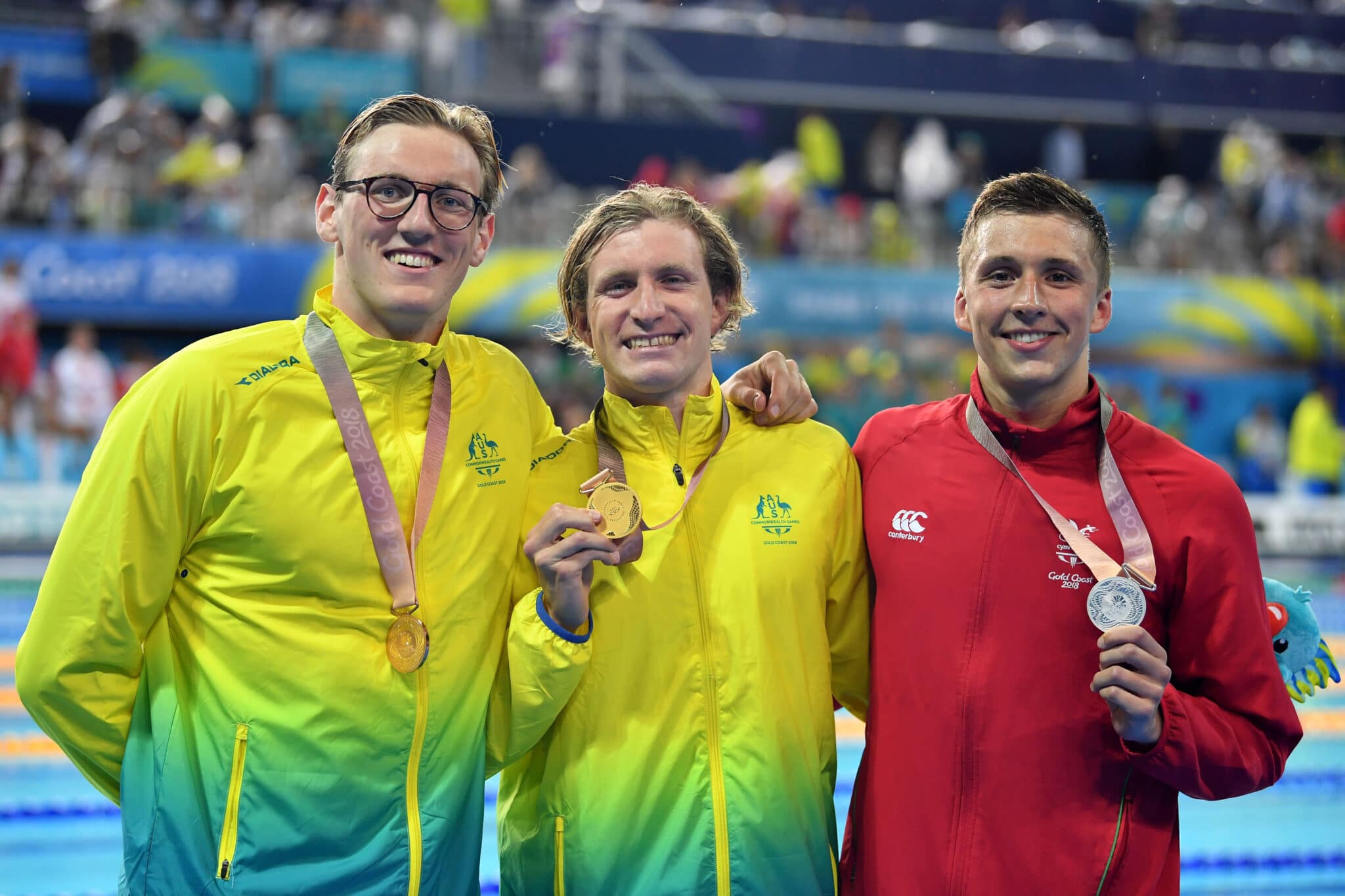 (R-L) Silver medalist Daniel Jervis of Wales, gold medalist Jack McLoughlin of Australia and bronze medalist Mack Horton of Australia pose during the medal ceremony