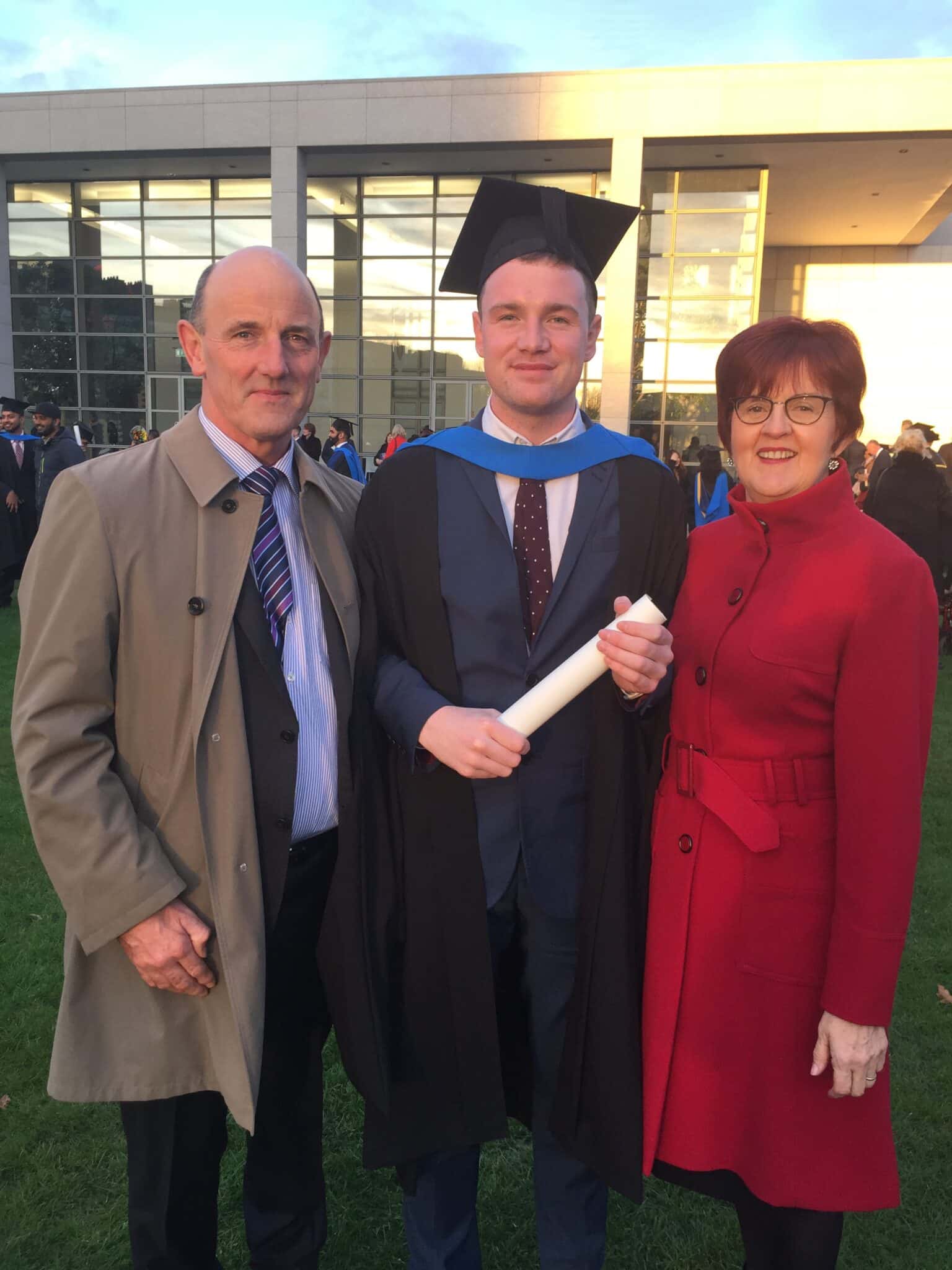 Domhnaill Harkin (C) with his father John (L) and his mother Suzanne (R). 