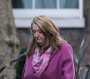 Sarah Dines walked towards Downing Street