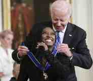 U.S. President Joe Biden presents the Presidential Medal of Freedom to Simone Biles, Olympic gold medal gymnast and mental health advocate, during a ceremony in the East Room of the White House July 7, 2022 in Washington, DC.