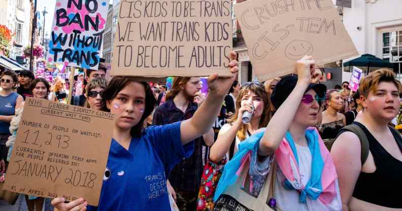 Thousands of people pass through Soho on a London Trans+ Pride march