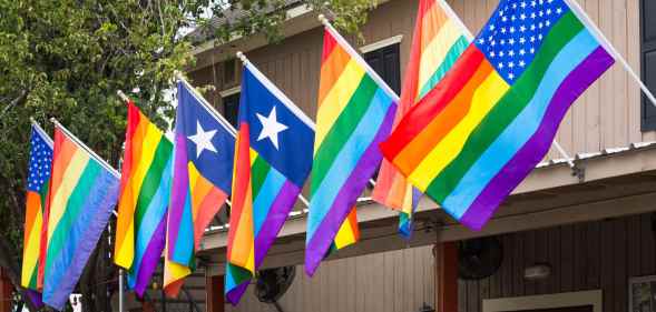 A gay US flag, USA Rainbow flag, US gay pride flag is proudly displayed in the city of Houston, Texas