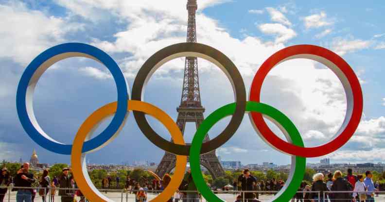 The Olympic rings placed in front of the Eiffel Tower