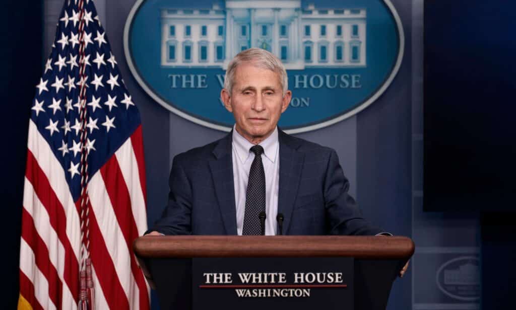 Dr Anthony Fauci speaks to a crowd gathered at the White House