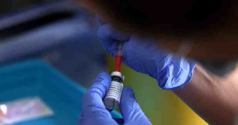 A medical professional prepares a dose of the monkeypox vaccine on July 23, 2022 in London, England.