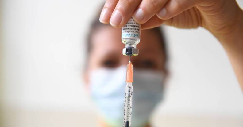 A photograph shows a syringe with a dose of the Monkeypox vaccine at the Edison municipal vaccination centre in Paris