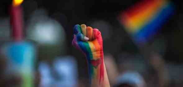 A hand with a rainbow