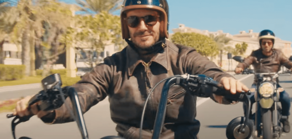 David Beckham rides a motorbike in Qatar